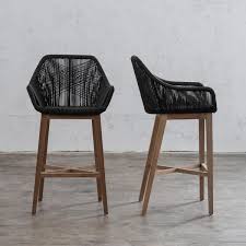 Simple wicker breakfast bar stools will be higher than a dining chair , enabling you to sit at the breakfast bar comfortably. Inizia Woven Rattan Outdoor Chair Indoor Bar Chair Hamptons Bar Stool Living By Design