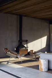 The daniella table legs are available in a standard dining height. Te Pakeke In New Zealand Is Hidden By Black Shutters And A Concrete Wall