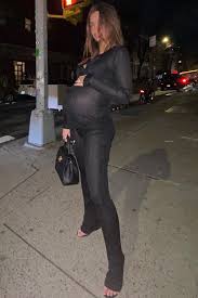 What kind of person will we become parents to? Pregnant Emily Ratajkowski Says She S Bout To Pop People Com