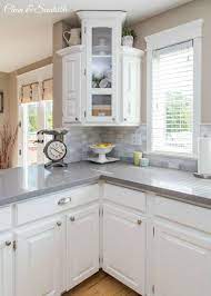 White and gray granite kitchen countertops offer a heavenly look that will set your kitchen apart. White Kitchen Reveal Home Tour White Kitchen Makeover Home Kitchens Kitchen Decor