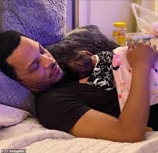 Download T I Rocks His One Month Old Granddaughter To Sleep And Says He S Completely In Love Daily Mail Online