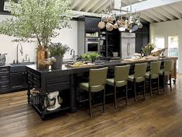 Design ideas for a traditional kitchen/diner in london with a submerged sink, shaker cabinets, blue cabinets, black appliances, an island, brown floors, white explore the beautiful kitchen ideas photo gallery and find out exactly why houzz is the best experience for home renovation and design. Kitchen Cabinet Ideas Houzz