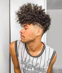 The fade haircut has generally been catered to men with brief hair, but lately, people have actually been incorporating a high fade with medium or long hair on the top. 3b Curly Hair Male Novocom Top