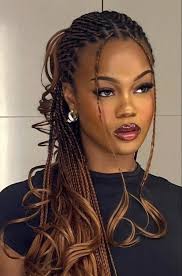 Isn't she beautiful. What do they call this style of hairdo? Now you know.  Greg Nwoko