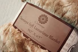 Chanasya fuzzy faux fur throw blanket, $29.99—$35.99; Chanasya Wolf Faux Fur Throw Review Surrounded By Softness