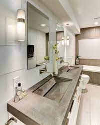 White bathroom with natural wood bathroom vanity with two vessel sinks. 13 Modern Bathroom Vanity Ideas Dwell