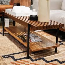 This table is perfect for weathering the elements with its painted steel finish. Slatted Wood Coffee Table Coffee Table Wood Rectangle Coffee Table Wood Coffee Table