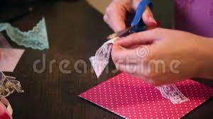 When you design your greeting cards, you have control over the look and sentiment so that your card delivers just the right message. The Girl Is Engaged In Making Greeting Cards At Home Using Paper Lace Braid And Other Materials Stock Footage Video Of Papers Items 109498546