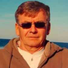 John Deere layoffs hit hard in Waterloo. Economists say tariffs and a  struggling farm economy are key factors.