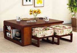 Buy Vesta Coffee Table Honey Mahogany Finish Cream Blossom Online In India Wooden Street Coffee Table Table Design Wooden Center Table Design