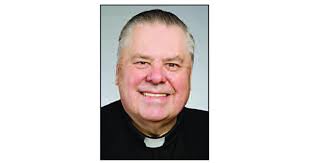 Retired Father Leonard James Downs dies at age 83