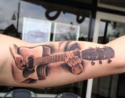 This is from a design i saw on bam margera's skate board skull elegant half sleeve tattoos half sleeve tattoos for guys full sleeve tattoos music tattoo. 65 Guitar Tattoos For Men Acoustic And Electric Designs Guitar Tattoo Design Music Tattoos Music Guitar Tattoo