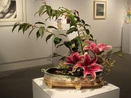 The programming language environment is asp.net. Ikebana Sue Grier Pottery
