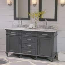 The bathroom's chrome furnishings reflect and bounce light around the room to add subtle sparkle. Home Decorators Collection Sonoma 60 In W X 22 In D Double Bath Vanity In Dark Charcoal With Carrara Marble Top With White Sinks 8105300270 The Home Depot