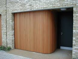 With Rundum Meir Custom Garage Doors You Can Create A Striking Statement That Blends Into And Enhances T Sliding Garage Doors Unique Garage Doors Garage Doors