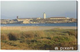 Esta almenara ostenta un par de privilegios entre las tarifeñas: Faro En Tarifa Cadiz Canvas Print Pixers We Live To Change