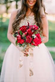 A wondering spirit, collecting poinsettias to make lovely winter bouquets to decorate the trails around her snow covered forest for lost travelers. Poinsettia Bouquet Wedding Bouquet Wedding Flower
