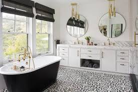 Bathroom vanity showroom in los angeles (la) , california (ca). Stunning Black And White Contemporary Bathroom Is Fitted With A Modern Black Cast Iron Tub Matched With A Vintage Brass Hand Held Tub F Black Bathtub Bathroom Interior Beautiful Bathrooms