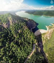 Lake Vidraru Romanian Lacul Vidraru Is An Artificial Lake In Romania It Was Created In 1965 By The Construction Romania Travel Visit Romania Turism Romania