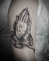 The hands clasped or folded together before the heart known as praying hands is a common payer gesture among the christians. Prayer Hands Tattoo Best Tattoo Ideas Gallery