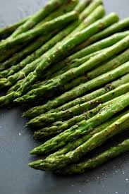 Rib eye steak lobster tail and asparagas. Steak Au Poivre Broiled Lobster Tail Roasted Asparagus