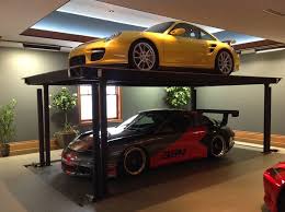 Take advantage of the unused space in your garage. 9 Prefab Garage Solutions For Auto Enthusiasts Garage Solutions Prefab Garages Garage Car Lift