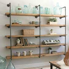 The way the floor flanges hold the shelves over their top is just amazing. How To Build Diy Industrial Pipe Shelves Step By Step Guide