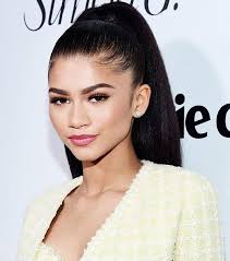 Grab all your hair and pull it back, bringing it to the top of your head and securing it into a ponytail. Hair Zendaya Hair Slick Hairstyles Wedding Ponytail Hairstyles