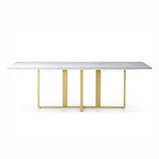 The long, oval top is made of sturdy acacia. Taiden Long Marble Dining Table Moredesign