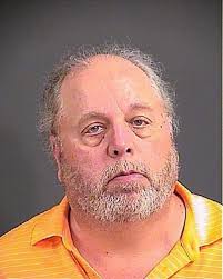 Man arrested in campaign sign destruction