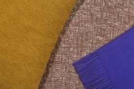 Beatrix pleated chair, light grey/brushed gold legs. Kvadrat Raf Simons High Fashion Fabrics For Your Home