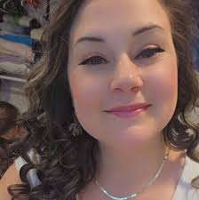 Should I safely move a spider and its egg sac from my work truck?