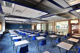 Axiom Blue Knife Edge Canopies With Op Tiles Dwr Y Felin School Neath Ceiling Contractor Richard Kemble Contracts Limited Specifier Neath Armstrong Ceiling