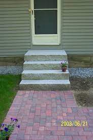 A Brick Walkway Leading To Granite Steps Outdoor Steps Front Steps Patio Design