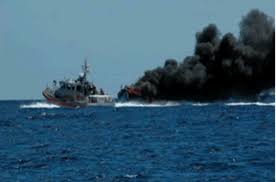 Father & son jump overboard as flames devour sailboat