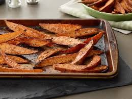 Get Paula Deen S Baked Sweet Potato Wedges Recipe From Food Network Baked Sweet Potato Wedges Food Network Recipes Sweet Potato Wedges