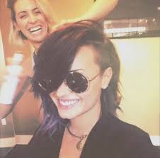 Her hair is currently brown and short. Demi Lovato Debuts Shorter Haircut And Colorful Streaks Glamour