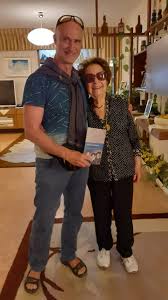 Ruth Zimmermann holds her first published memoirs in her hand