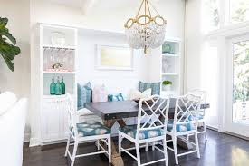 Shop wayfair for all the best bench kitchen & dining room sets. Sunny Coastal Dining Room With Bench Seating Surrounded By Shelf Frame Dark Wood Dining Table And Blue Accents Hgtv