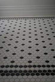 So how do you add some personality to your floor if you're not interested in a simple grid for your 12 x 24 or 24 x 24 large format tiles? Black And White Hex Tiles With Border Lois I Think This Is What I Am Doing Black And White Hex Tile Black And White Hexagon Tile Patterned Floor Tiles
