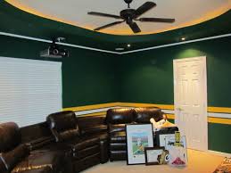 Logo of nfl club in background, edit space. His Office Paint Green Bay Packers Man Cave Green Bay Packers Room Green Bay