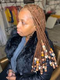 Knotless Box Braids With Beads In 2021 Black Girl Braided Hairstyles Knotless Box Braids With Beads Box Braids With Beads