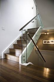 Sleek Maple Stairs With Glass Railing And Stainless Steel Handrail Glass Staircase Railing Glass Railing Stairs Staircase Design