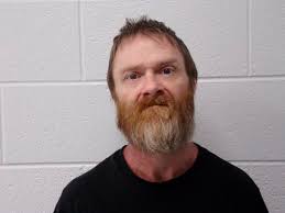 Man charged with violating probation