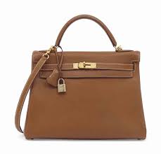 If your answer is yes, then you are in. Sac Kelly Retourne 32 En Cuir Togo Gold Garniture En Metal Dore Sac Kelly Sac Birkin Hermes Sac