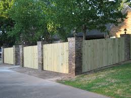 Pin By Chelsea Perry On Living Outside Wood Fence Brick Fence Fence Design