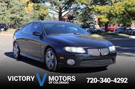 Image result for Dark Otter Gray 2004 Pontiac