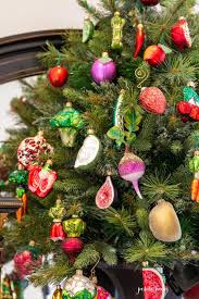 Tiny brussels sprouts, red and green cabbage, celery, leeks and root vegetables. The Fruit And Vegetable Christmas Tree Petite Haus