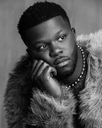 It's giving “Wakanda Made me, but God Saved Me.”