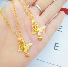 As you can see from the karat numbers of 24k and 14k gold, the latter is less pure. Beautiful Women Jewelry Real 18 K Gold Butterfly Design Pendant Chain Necklace 16 30 Inch Water Wave Chain Wish